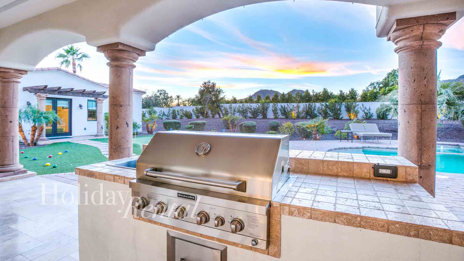 luxury vacation rental pool side grill