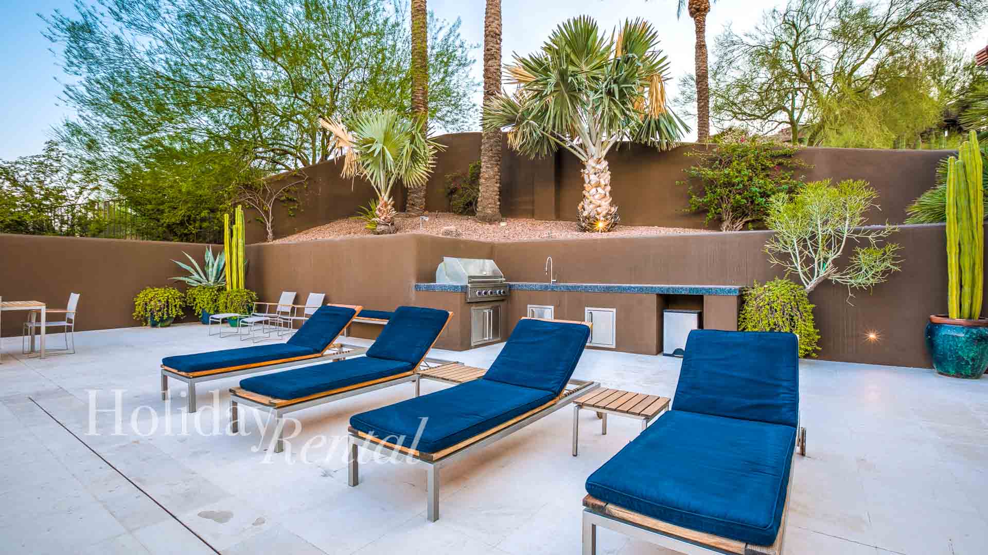 vacation rental pool side lounging