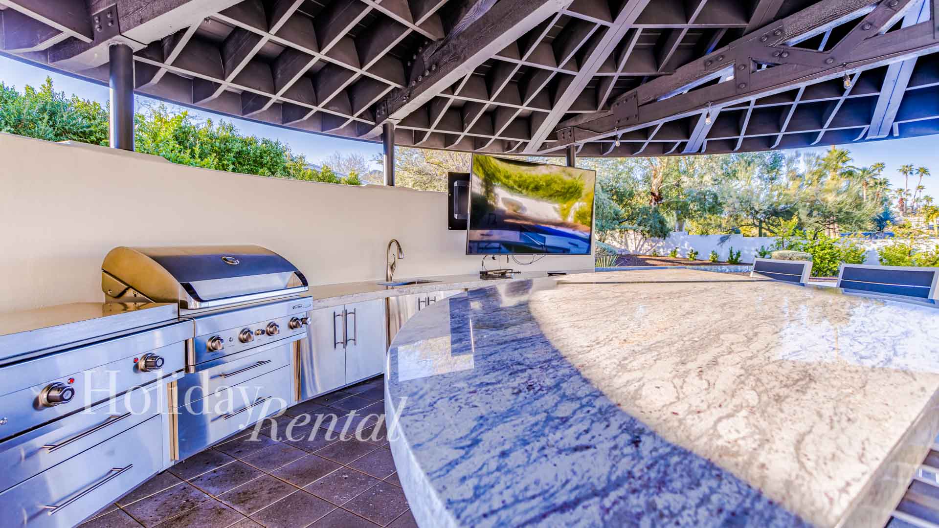 vacation rental outdoor kitchen and tv