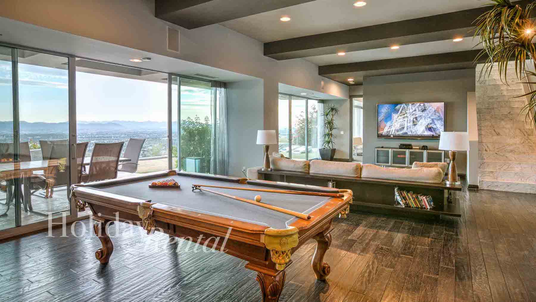 vacation rental living room with billiards table