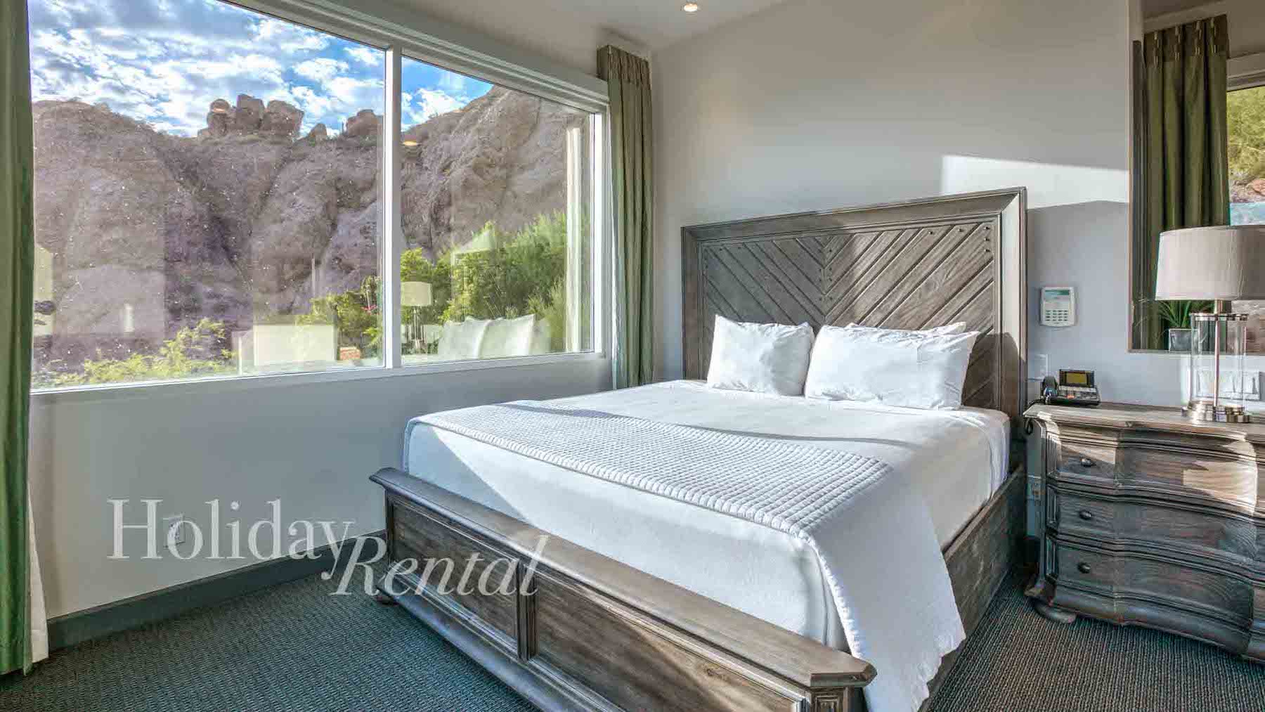 vacation rental bedroom with window views