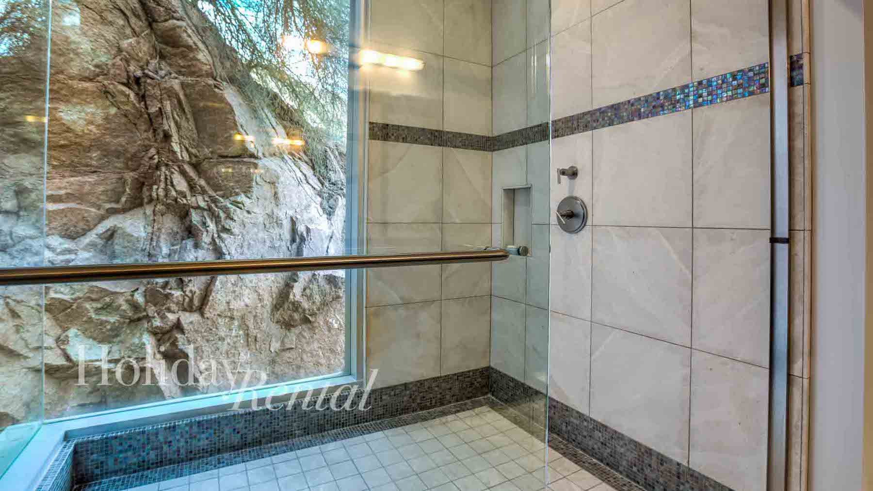 vacation rental shower with mountain views