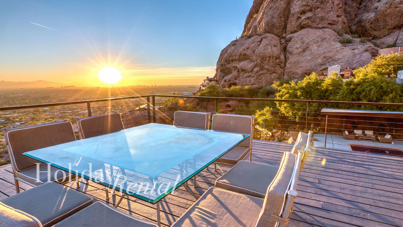 vacation home outdoor dining with views of camelback mountain