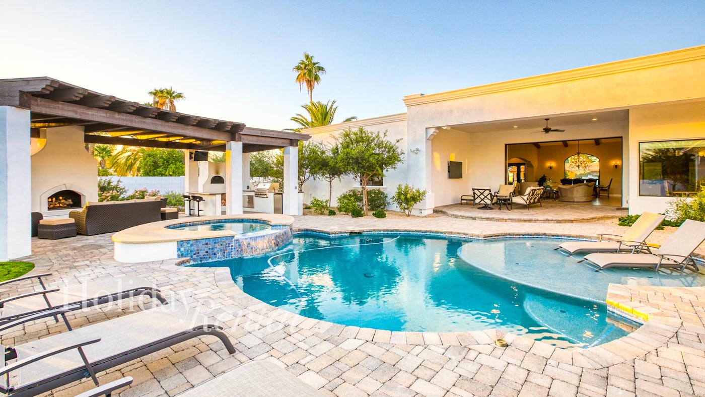 luxury vacation rental with pool and back patio