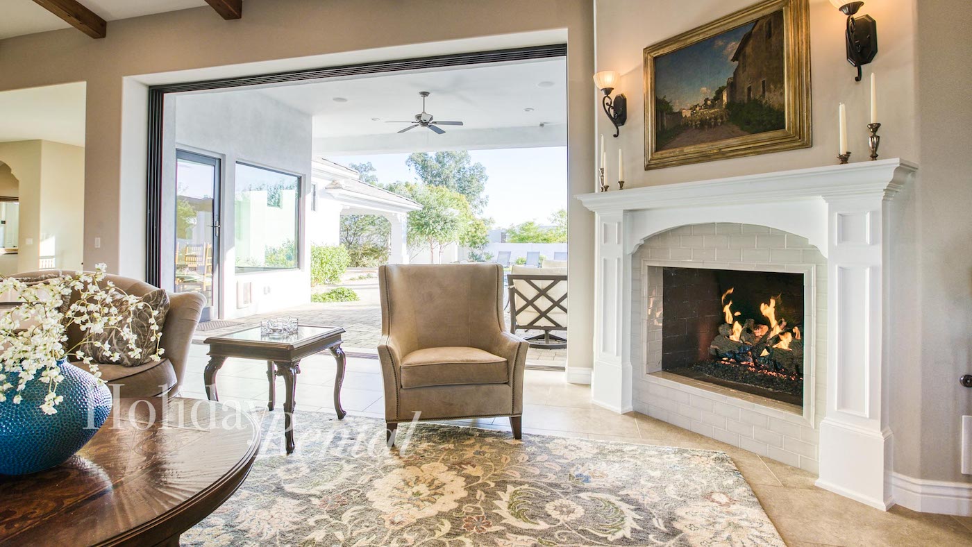 vacation rental with fireplace and patio access
