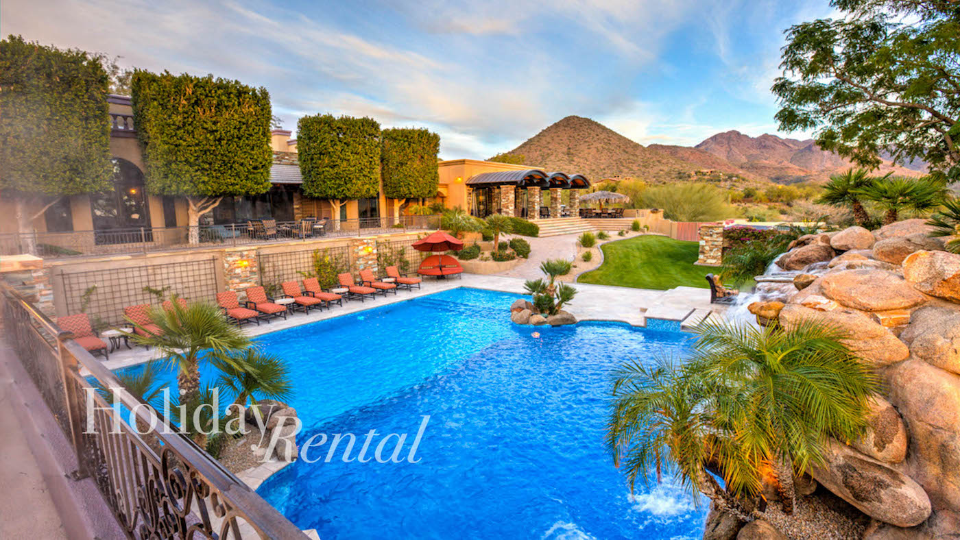 vacation rental with resort-style backyard