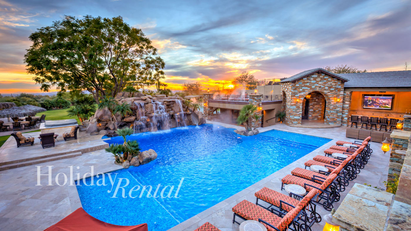 luxury vacation rental pool with a waterfall