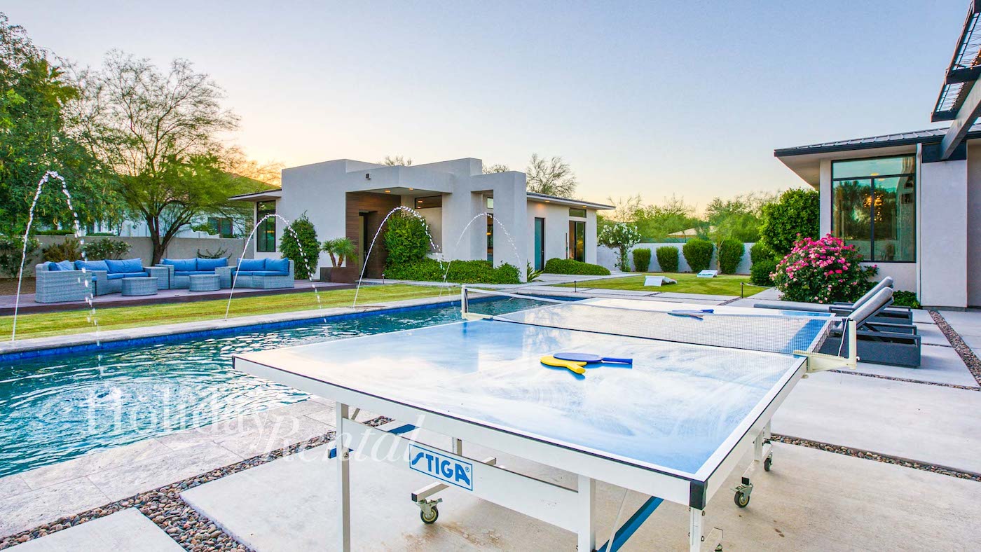 luxury vacation rental with pool and ping pong table