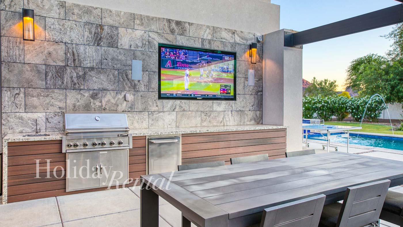 vacation rental patio with tv