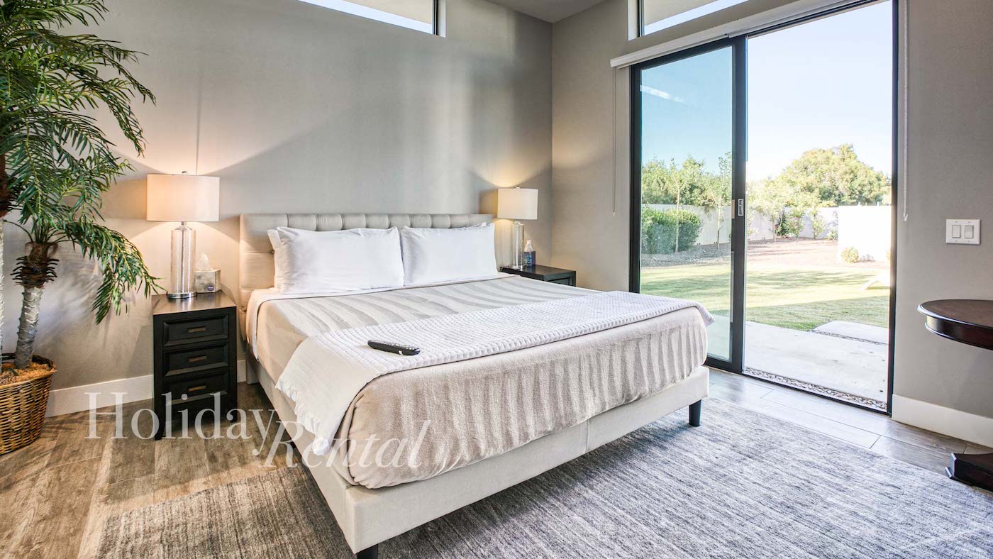 vacation rental bedroom with beautiful window views
